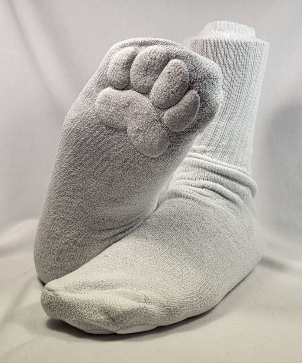 Gray socks with paw print design on a white background